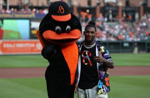 Deonte Harty Throws out First Pitch